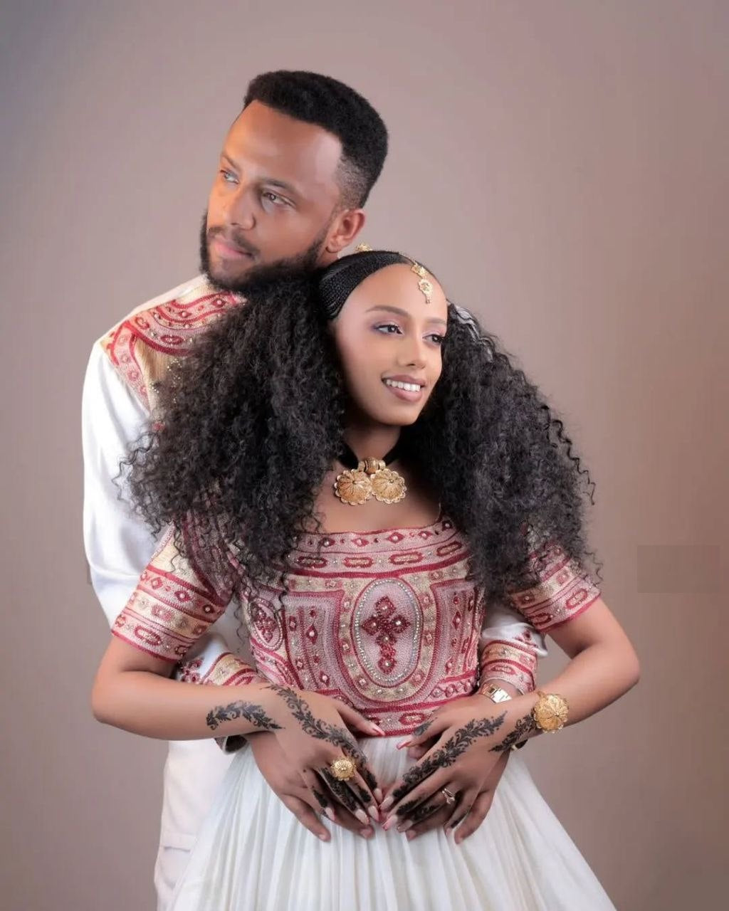 Detailed Cross Embroidery Habesha Wedding Dress & Groom’s Set – Earth-Toned Elegance | Shiromeda Threads