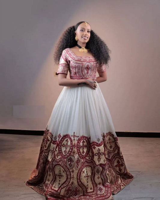 Detailed Cross Embroidery Habesha Wedding Dress & Groom’s Set – Earth-Toned Elegance | Shiromeda Threads